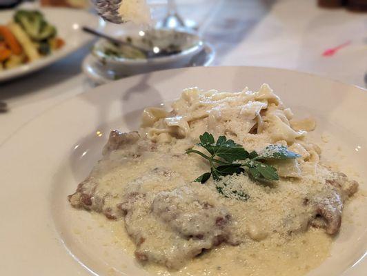 Veal in a four cheese sauce and fettuccini