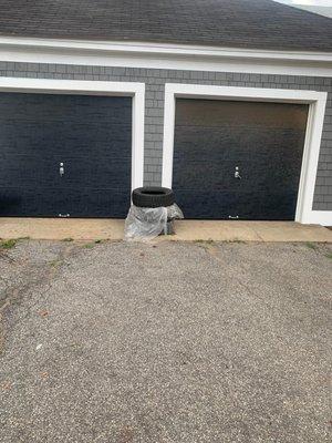 Our handyman installed a new roof, siding, and new garage doors for this home in Methuen, MA.