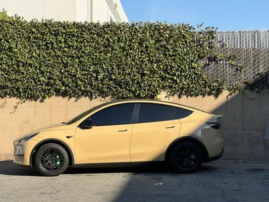 Tesla model y custom calipers, tint, and wrap