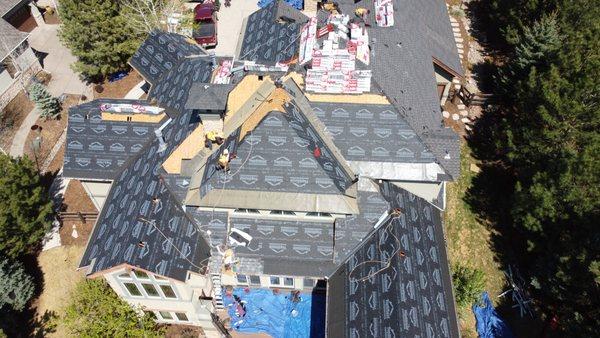 Re-roofing hail damaged apartment compklex