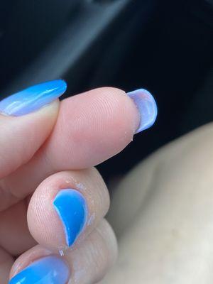 They didn't even fully remove the coral SNS that was on prior. Also notice the nail that's chipped under.