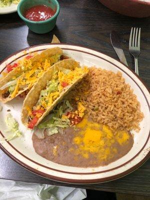 Taco plate served on a hot plate, excellent food.