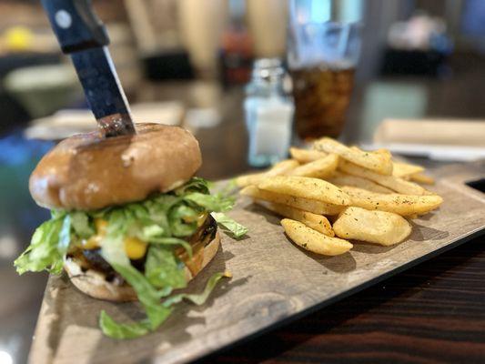 Cheeseburger with steak fries.