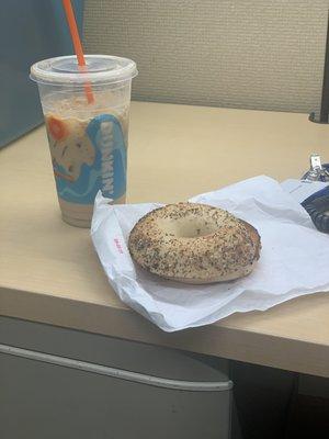 Pumpkin spice latte iced and everything bagel toasted, my order to go while at work