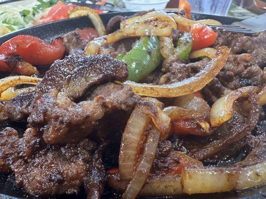 The onions and peppers grilled nicely and the steak cooked very well.