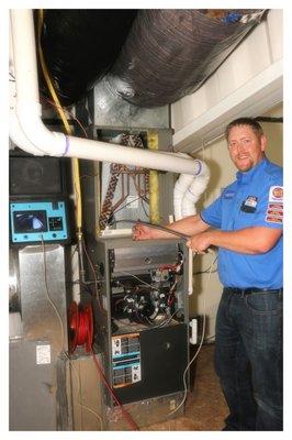 Our Service Manager Demonstrating a Heat-Exchanger Inspection