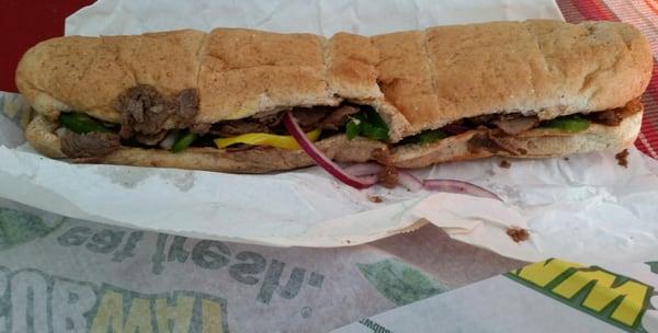 Steak and cheese footlong toasted sub.