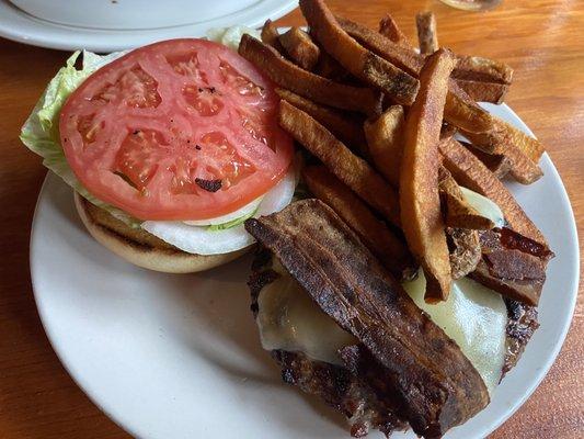 Burger with cheese and bacon, side of fries