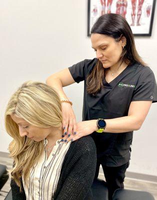 Dr Stefanie Tropea, DC ProClinix Armonk Chiropractor utilizing Active Release Techniques for tight muscles in the neck that cause headaches