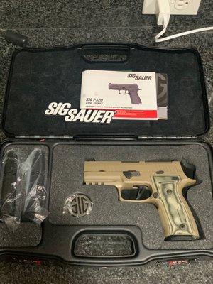 Sig Sauer P320 AXG Scorpion with challenge coin and case.