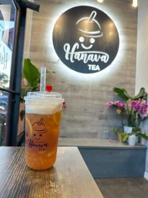 Mango lemon peach fruit tea with mango popping boba