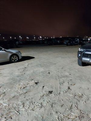 I was glad to at least be in the well-lit part of the dirt lot.