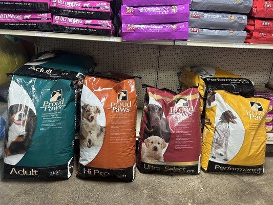 We carry several pet foods...Proud Paws, Earthborn, Joy and Ultimates Chicken and Rice for dogs, and Proud Paws, Sportmix, Tuffy's for cats.