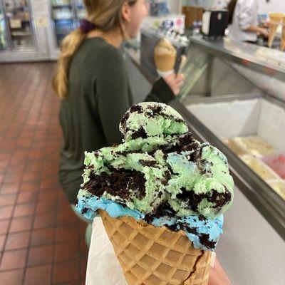 Oreo mint and Cookie Monster flavors in a waffle cone