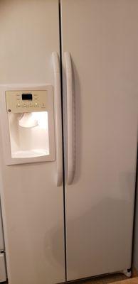 Refrigerator with water and ice dispenser