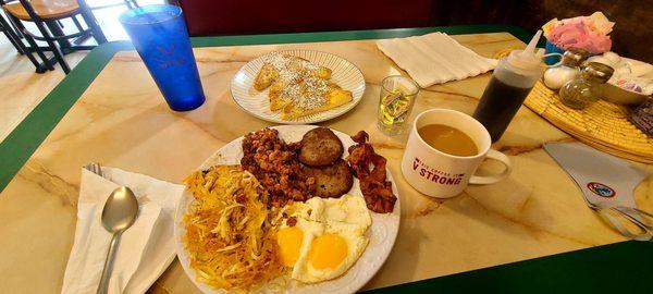 Breakfast sampler with Hash brown and corned beef hash sides added.