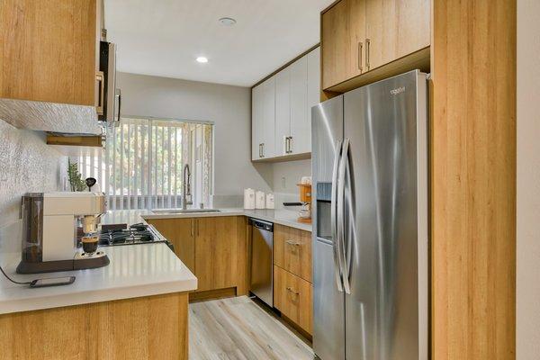 Newly Renovated kitchen featuring stainless steel appliances and quartz countertops.