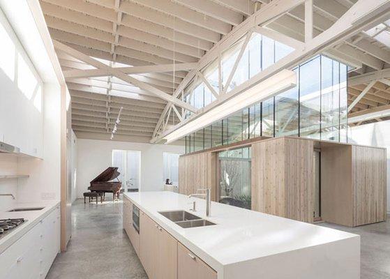 kitchen, island, and paneled architectural features