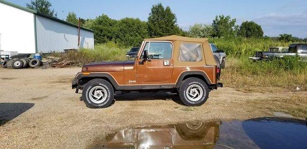 Complete cleanup on this Jeep, including rust repair on the frame.