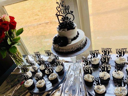 Custom cake, Two tier cake and black, white and silver cupcakes