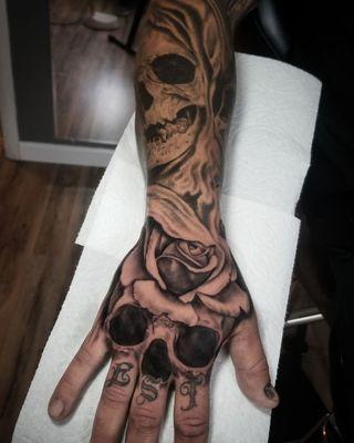 Skull sleeve tattoo