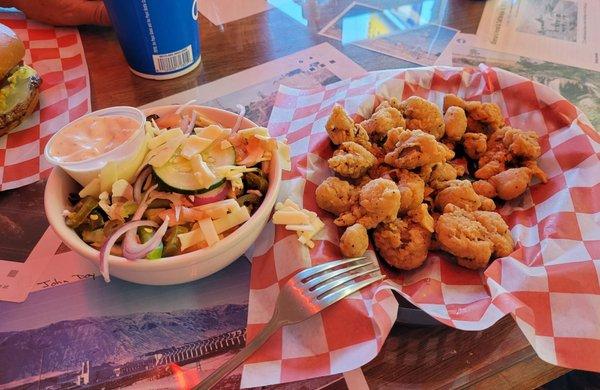 Chicken gizzards with a side salad.