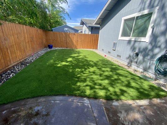 This grass is made from a durable, fade-resistant synthetic material that is soft and designed to stay upright.