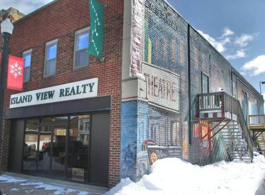 Island View Realty Building with mural on West side of building.