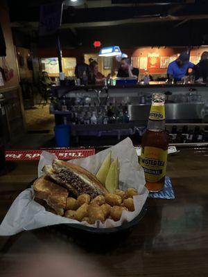 Patty melt with Salt and vinegar rubbed tater tots.