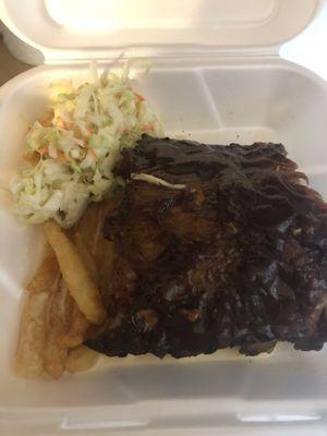 Ribs with slaw and fries.