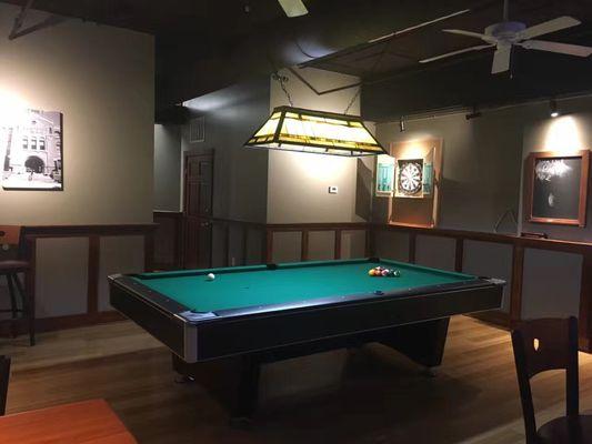 9 foot professional grade Brunswick pool tables and steel tipped darts