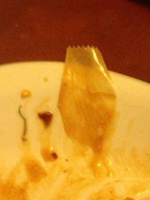 This was in my food!! Found the staple the hard way - between my teeth. Disgusting!