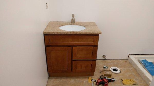 30" Kingway Cabinets Bathroom Vanity in Honey Oak Shaker Style.