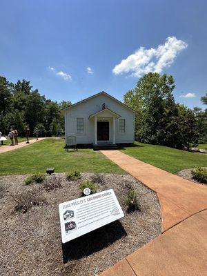 Original chapel moved up to this spot, in one piece, from down the hill.  They since heavily repaired a lot of rotted wood.