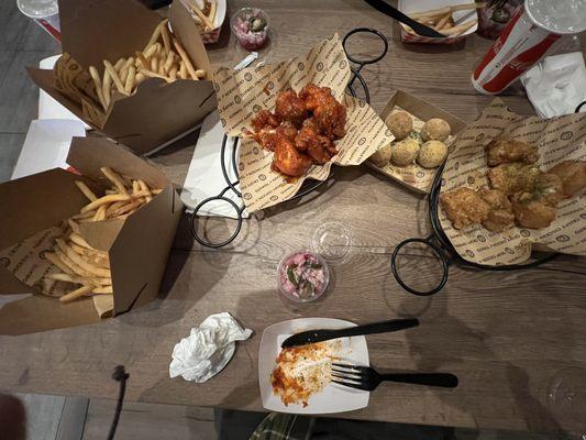 Medium boneless (honey butter/classic mild), French fries, one with cheese snow, cheese ball, and pickled cabbage with jalapeños.