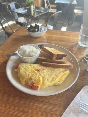 Tomato omelet and grits