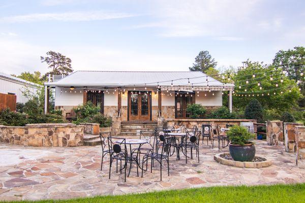 From courtyard with fire pit and outdoor bar.