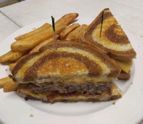 boozie melt 2 different kinds of cheese, grilled onions mushrooms and a 1/2 lb patty on marble rye. So good!