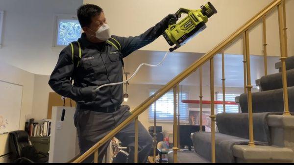 Disinfecting office stairwell with Microsure