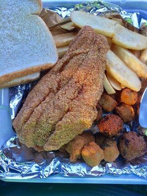 Fried Catfish 1 piece hush puppies fried okra fries and bread.