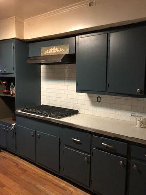 Painting the kitchen cabinet . Subway tile backsplash