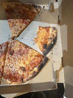 Simple "blackened crust" cheese pizza. 4 stoned employees on a Sunday evening.