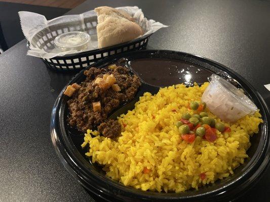 Picadilla & yellow rice w/ black beans and Cuban bread.