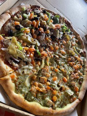 Medium half vegetarian/half chicken pesto pizza. Delish!