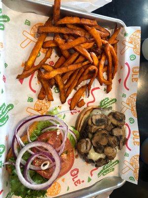 Mushroom Swiss burger with sweet potato fries.