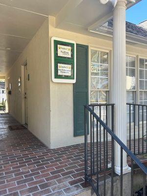 Exterior of the office building with identifying signage.