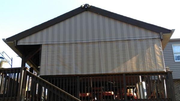 Permanent gable enclosure curtain with a roll up drop curtain