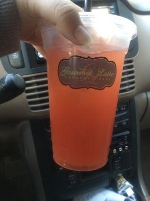 Passionfruit, strawberry, lime, and a splash of orange juice redbull Italian soda