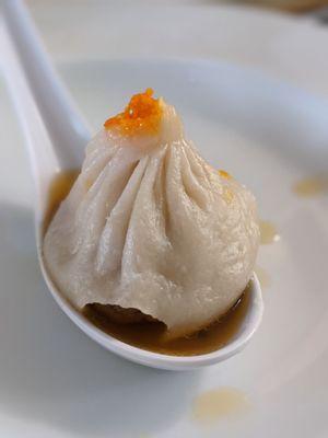 Home steamed frozen soup dumpling with crab roe