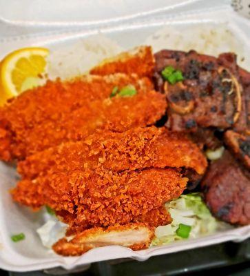 Chicken katsu and beef kalbi combo with steamed rice.